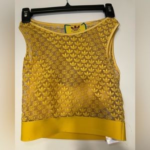 Yellow Gucci and Adidas cropped top. Size medium.